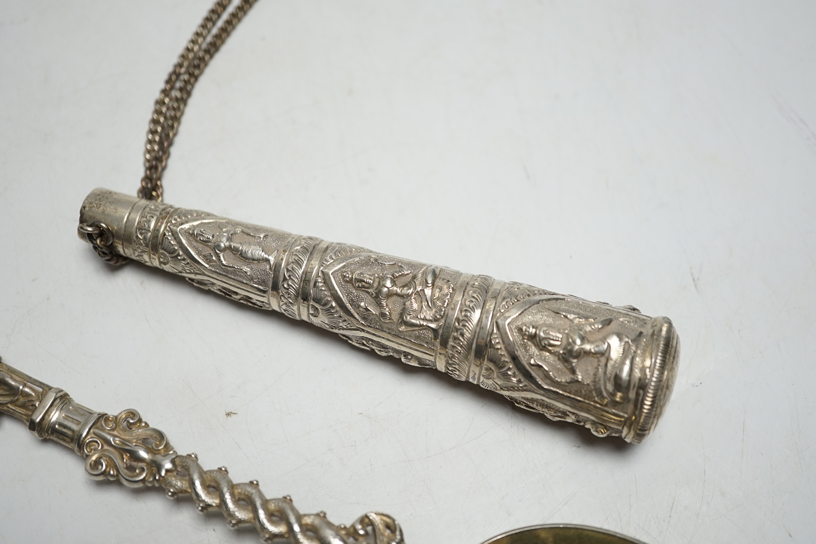 A Victorian silver apostle spoon, Francis Higgins, London, 1884, 20.2cm and an Indian white metal cane handle.
